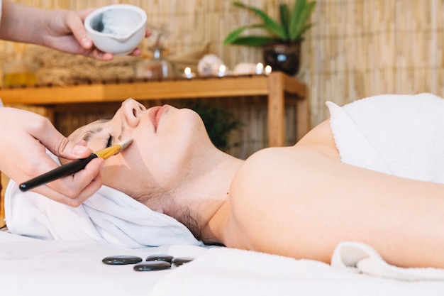 Spa and massage concept with relaxed woman