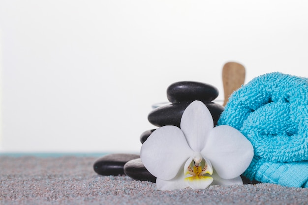 Spa objects on grey towel