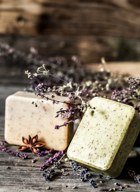 Free photo spa soap on wooden background