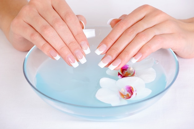 Free photo spa treatment for female hands with beauty french finger