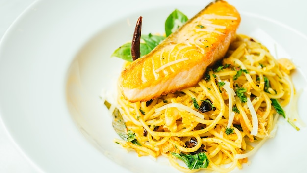 Spaghetti and Pasta with salmon fillet meat