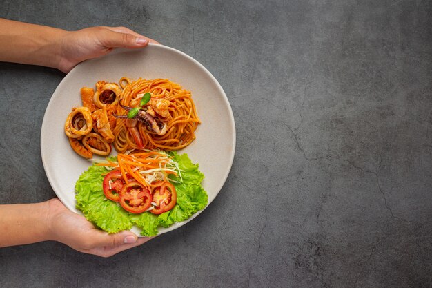 Spaghetti Seafood with Tomato Sauce Decorated with beautiful ingredients.