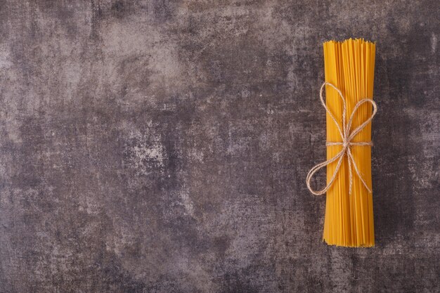 spaghetti top view with copy space on gray surface