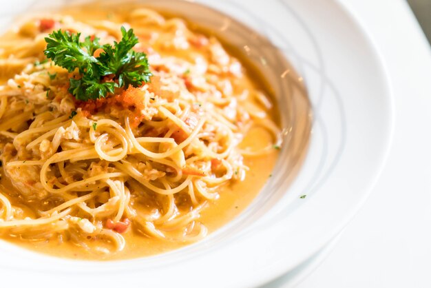 Premium Photo | Spaghetti with crab sauce