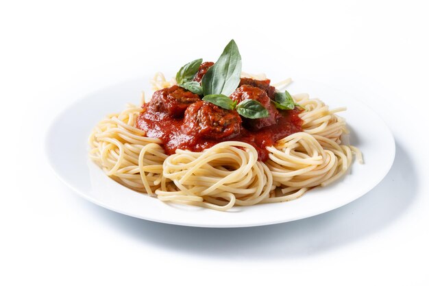 Spaghetti with meatballs isolated on white background