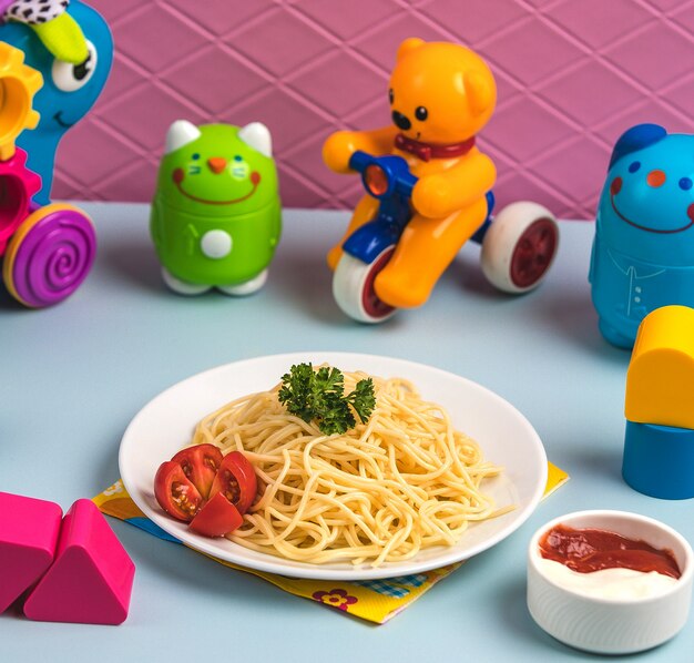 Spaghetti with tomato on the table