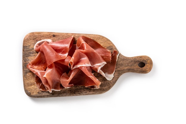 Spanish serrano ham on cutting board