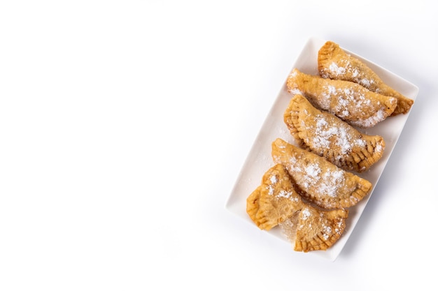 Spanish sweet stuffed pastry filled with angel hair isolated on white background