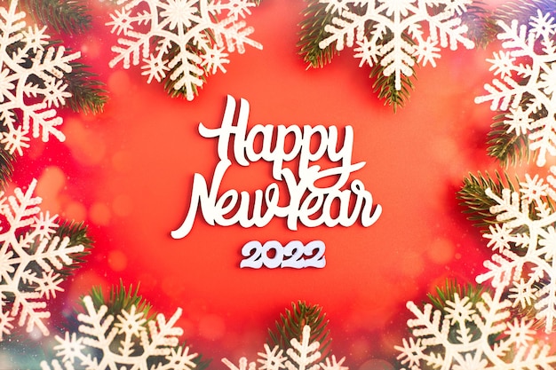 Sparkle bokeh lights on red canvas background. merry christmas card. winter holiday theme. happy new year.