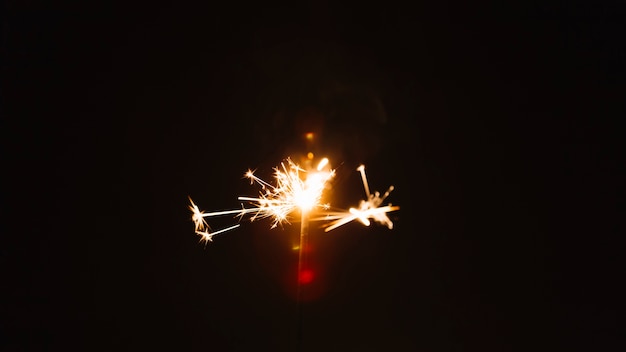 Free photo sparkler on black background