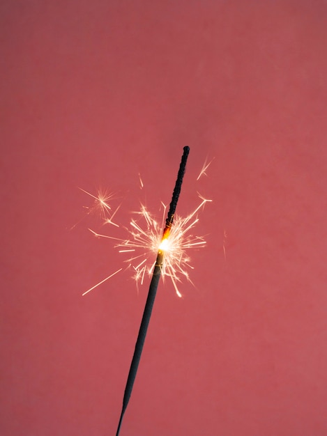 Sparkler lighting on red