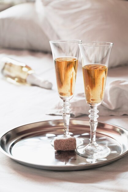 Sparkling champagne glasses on a tray