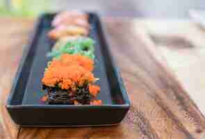 Free photo spawn eggs sushi with mixed sushi set