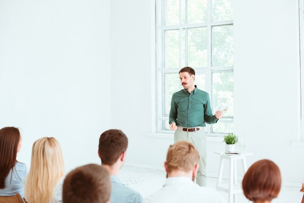 Speaker at Business Meeting in the conference hall.