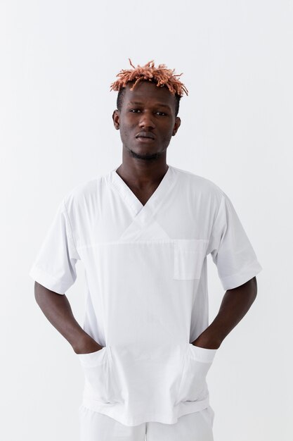 specialist male doctor having his hands in the pockets