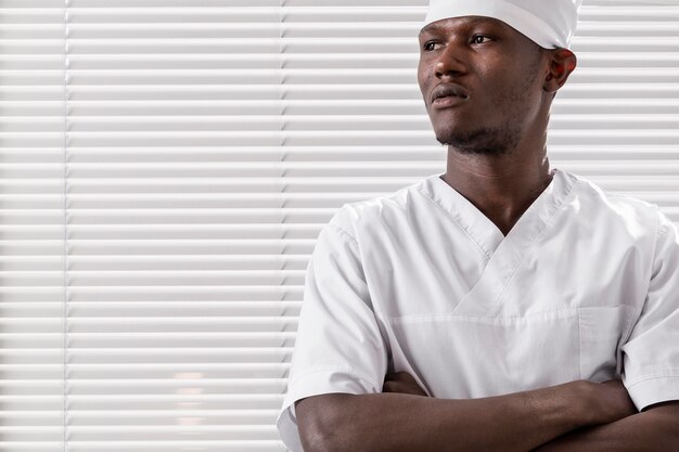 specialist male doctor looking away