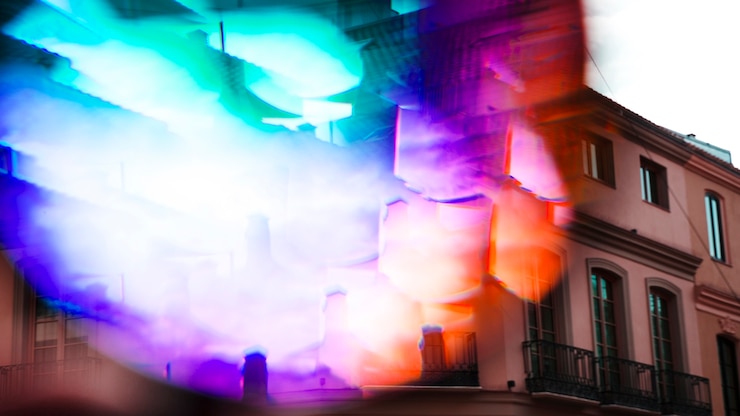 Free Photo spectrum multicolored light on the exterior of building