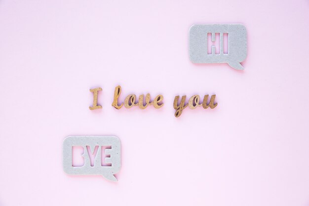 Speech bubbles near I love you writing