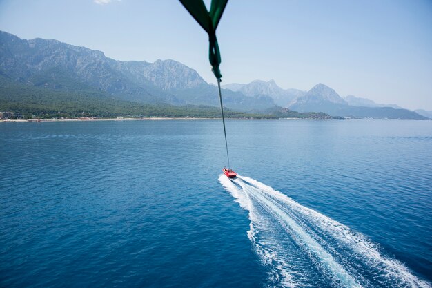 Speedboat with parachute