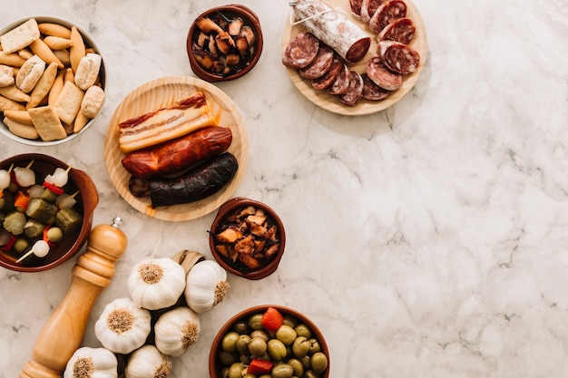 Spices and assorted food on marble tabletop