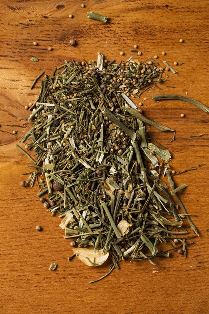 Spices. Heap of greens on the table