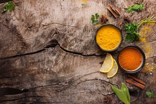 Spices and lemon slices flat lay