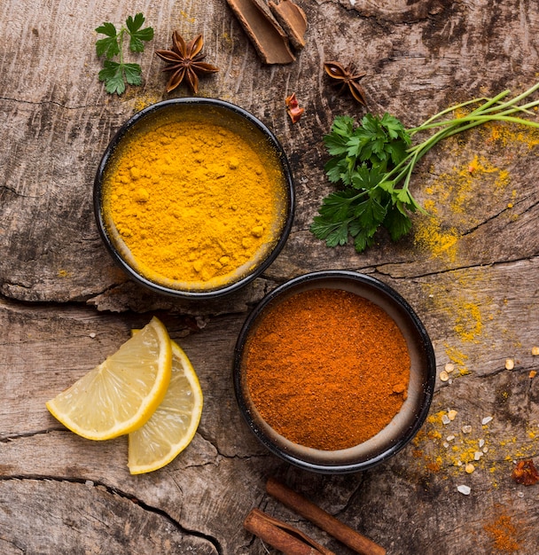 Spices and lemon slices top view