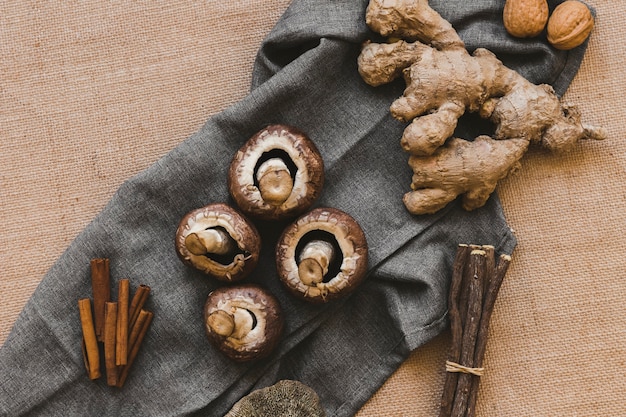 Spices near mushrooms and sticks