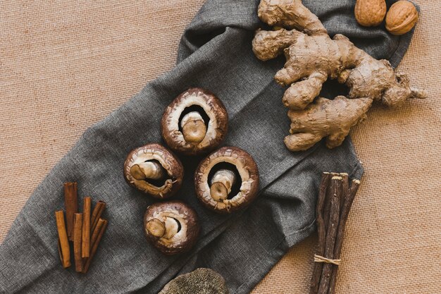 Spices near mushrooms and sticks