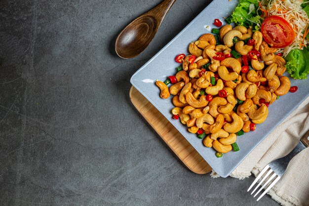 Spicy cashews topped with chopped hot chilli.