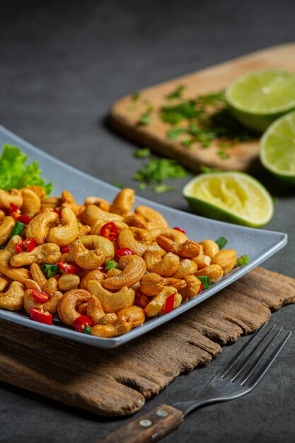 Spicy cashews topped with chopped hot chilli.