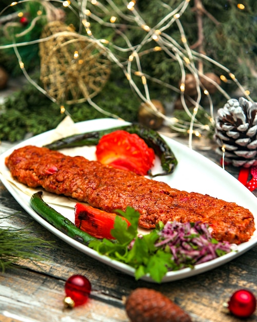 Spicy chopped meat with fried vegetables