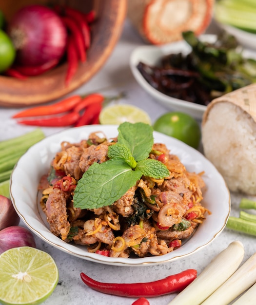 Spicy minced pork in a white plate.