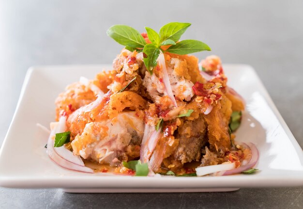 spicy salad with fried chicken