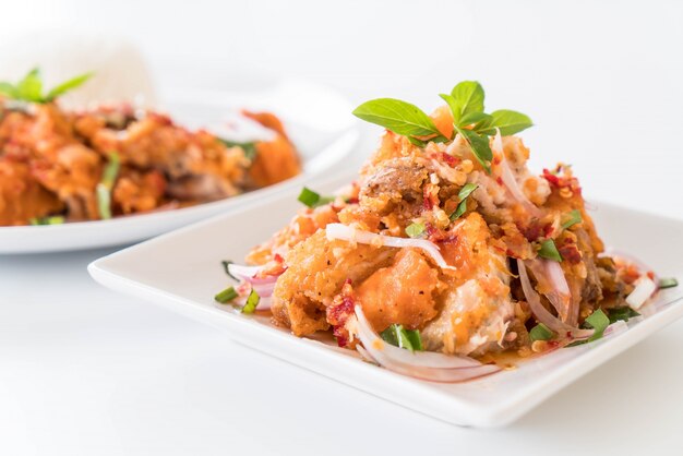 spicy salad with fried chicken