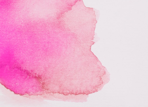 Spill of fuchsia and red paint