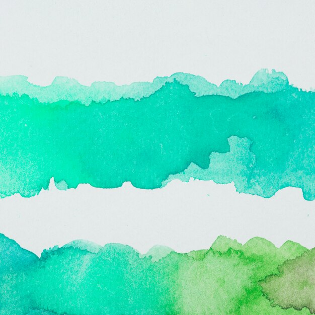 Spills of emerald and green watercolor