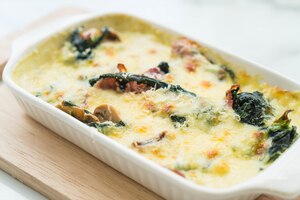 spinach lasagna in white plate