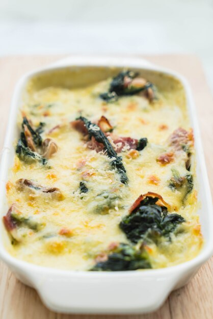 spinach lasagna in white plate