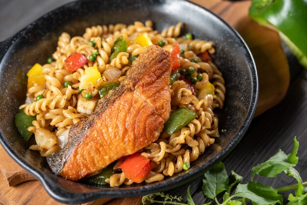 Spiral pasta with salmon and vegetables