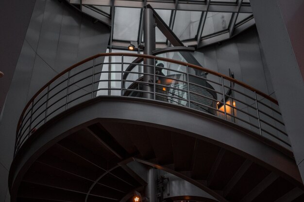 Spiral staircase with metallic railing