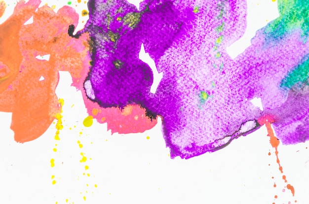 Free photo splash of colorful watercolor on white background