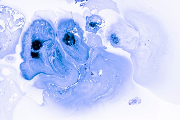 Splashes of blue acrylic paint effect