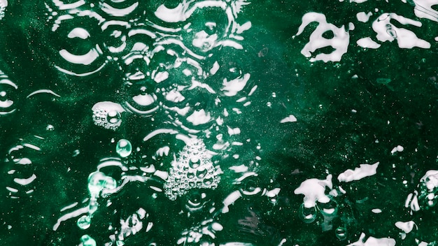 Splashes on green water