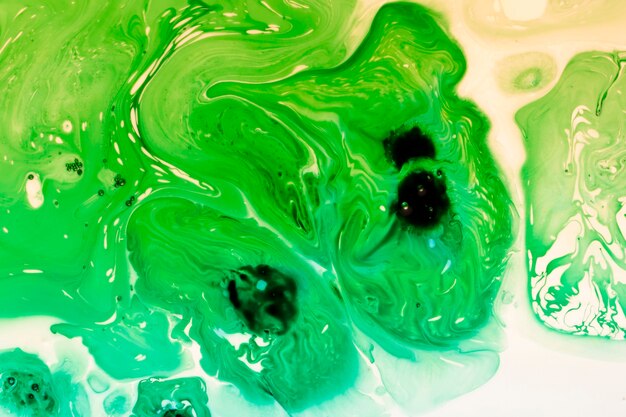 Splashes of gren acrylic paint effect