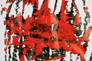 Free photo splashes of red and black paint