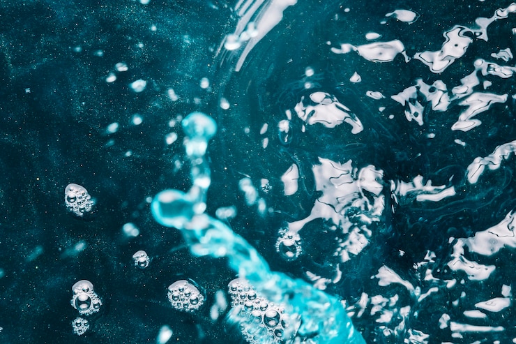 Free Photo splashes and specks of light on water