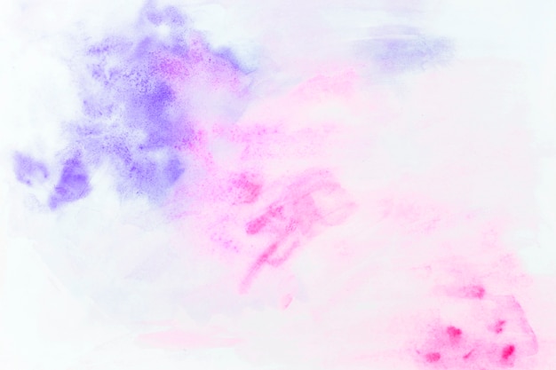 Splashes of violet and magenta watercolor