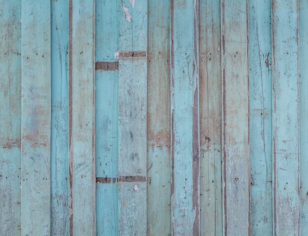 Spoiled blue wood wall