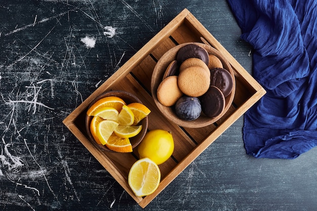 Sponge cookies with chocolate and lemon. 